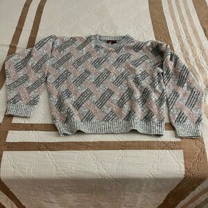 A sweater from Bealls Florida sport mixed colors. it’s an extra large.